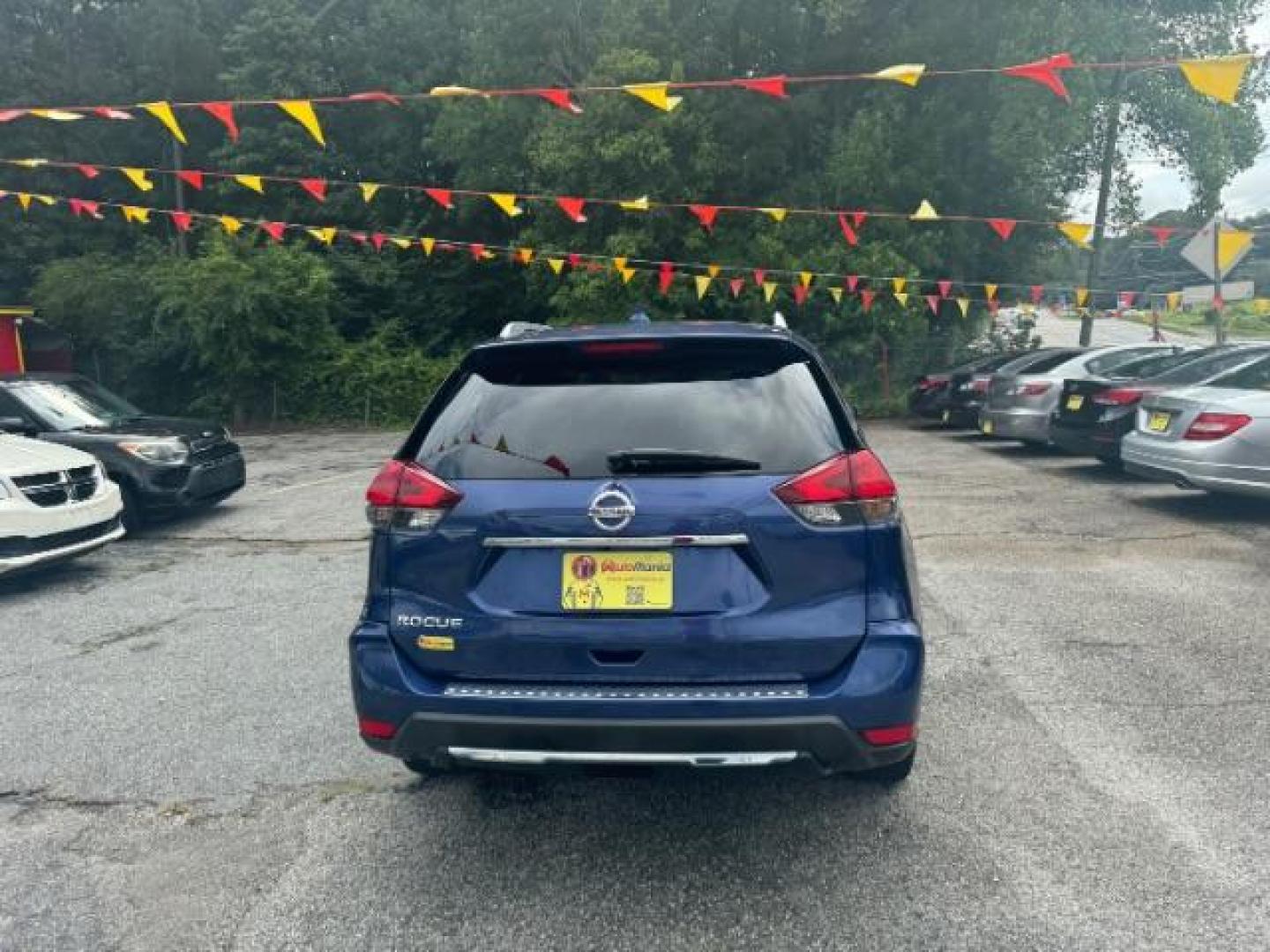 2017 Blue Nissan Rogue S 2WD (JN8AT2MT9HW) with an 2.5L L4 DOHC 16V engine, Continuously Variable Transmission transmission, located at 1806 Veterans Memorial Hwy SW, Austell, GA, 30168, (770) 944-9558, 33.817959, -84.606987 - Photo#4