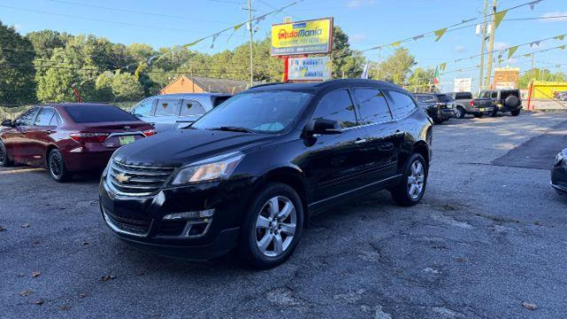 2016 Black Chevrolet Traverse 1LT FWD (1GNKRGKD0GJ) with an 3.6L V6 DOHC 24V engine, 6-Speed Automatic transmission, located at 1806 Veterans Memorial Hwy SW, Austell, GA, 30168, (770) 944-9558, 33.817959, -84.606987 - Photo#0