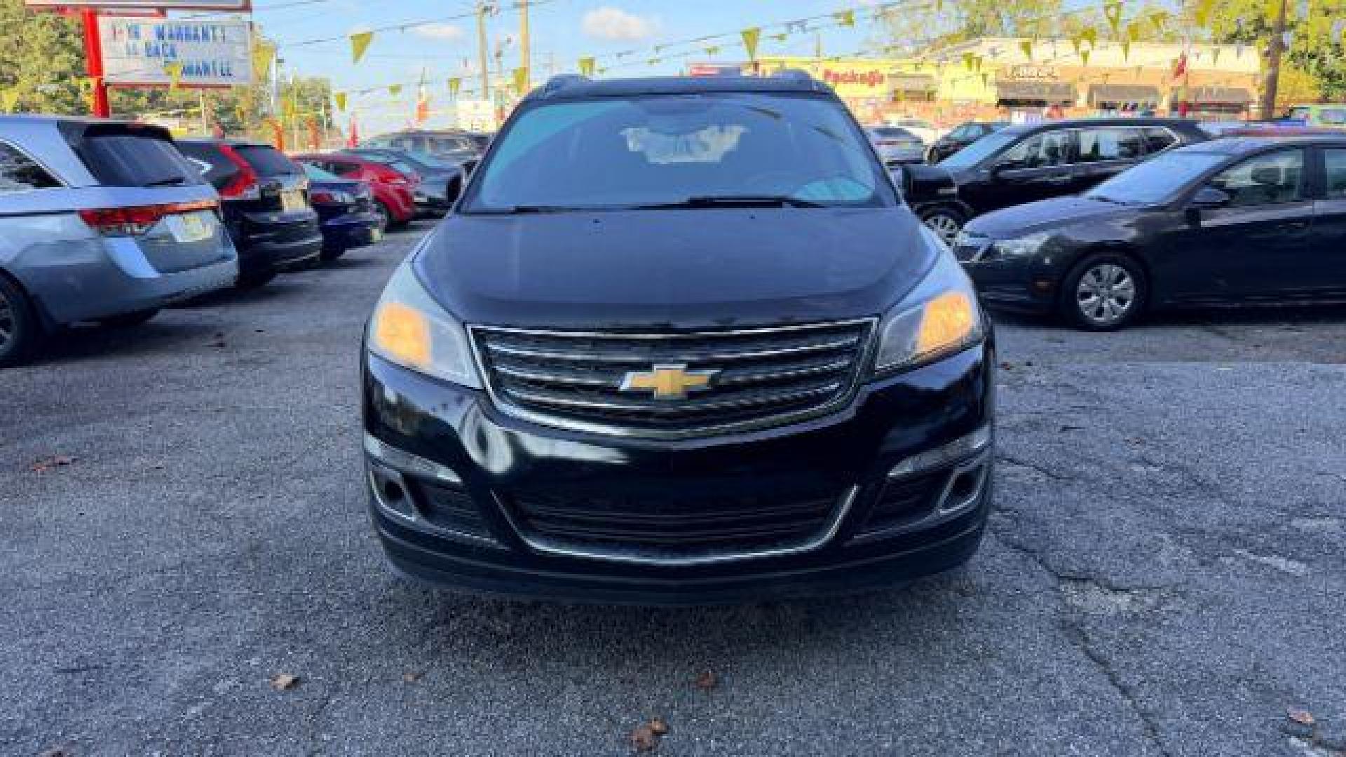 2016 Black Chevrolet Traverse 1LT FWD (1GNKRGKD0GJ) with an 3.6L V6 DOHC 24V engine, 6-Speed Automatic transmission, located at 1806 Veterans Memorial Hwy SW, Austell, GA, 30168, (770) 944-9558, 33.817959, -84.606987 - Photo#1