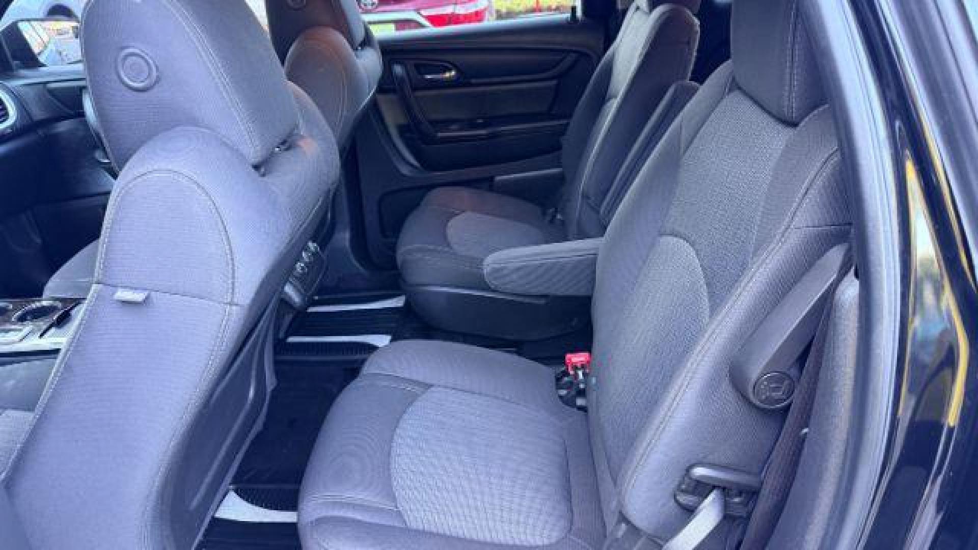 2016 Black Chevrolet Traverse 1LT FWD (1GNKRGKD0GJ) with an 3.6L V6 DOHC 24V engine, 6-Speed Automatic transmission, located at 1806 Veterans Memorial Hwy SW, Austell, GA, 30168, (770) 944-9558, 33.817959, -84.606987 - Photo#7