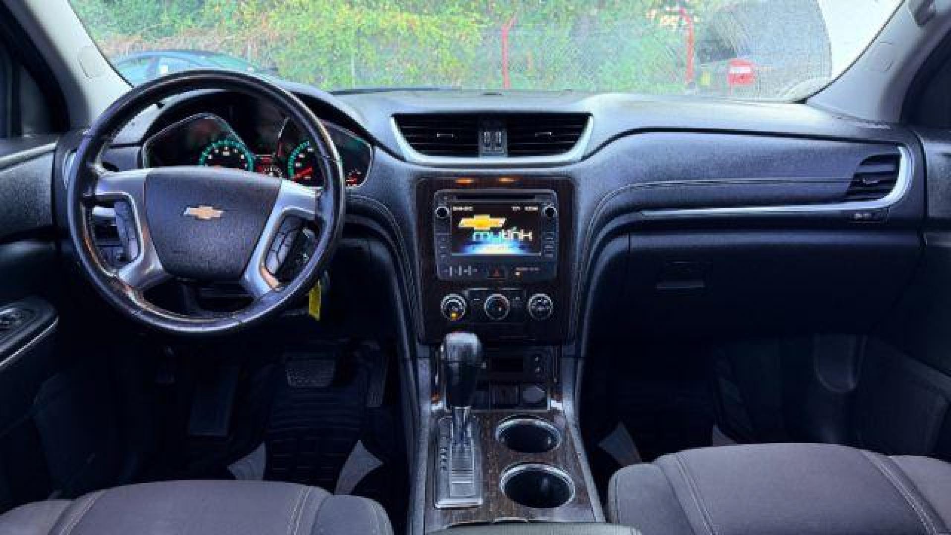 2016 Black Chevrolet Traverse 1LT FWD (1GNKRGKD0GJ) with an 3.6L V6 DOHC 24V engine, 6-Speed Automatic transmission, located at 1806 Veterans Memorial Hwy SW, Austell, GA, 30168, (770) 944-9558, 33.817959, -84.606987 - Photo#9