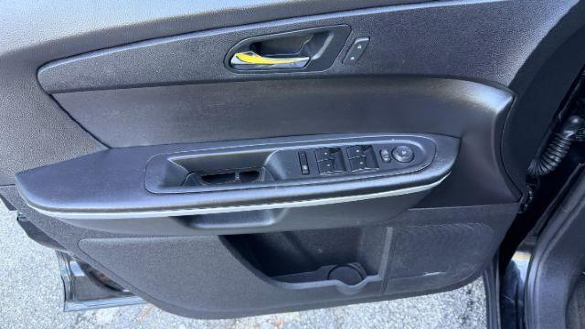 2016 Black Chevrolet Traverse 1LT FWD (1GNKRGKD0GJ) with an 3.6L V6 DOHC 24V engine, 6-Speed Automatic transmission, located at 1806 Veterans Memorial Hwy SW, Austell, GA, 30168, (770) 944-9558, 33.817959, -84.606987 - Photo#10