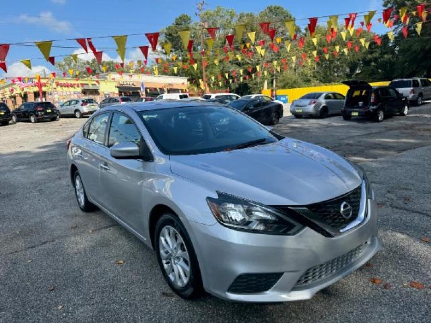 2019 Silver Nissan Sentra SV (3N1AB7AP7KY) with an 1.8L L4 SFI DOHC 16V engine, Continuously Variable Transmission transmission, located at 1806 Veterans Memorial Hwy SW, Austell, GA, 30168, (770) 944-9558, 33.817959, -84.606987 - Photo#2
