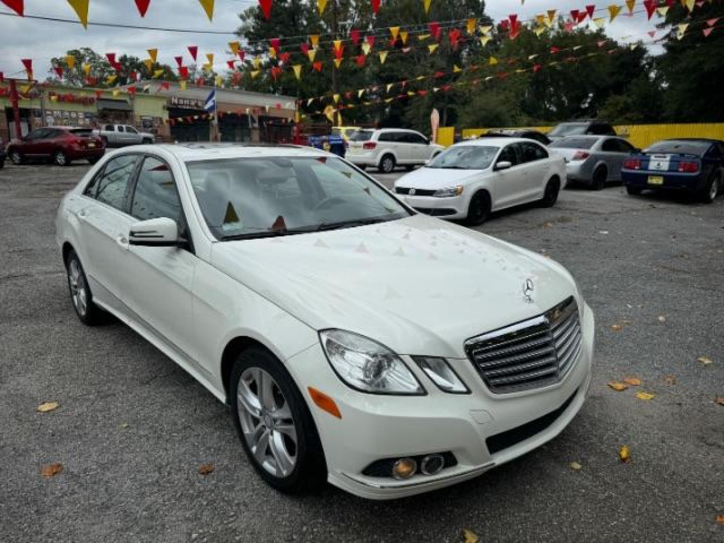 2011 White Mercedes-Benz E-Class E350 Sedan 4MATIC (WDDHF8HB0BA) with an 3.5L V6 DOHC 24V engine, 7-Speed Automatic transmission, located at 1806 Veterans Memorial Hwy SW, Austell, GA, 30168, (770) 944-9558, 33.817959, -84.606987 - Photo#2