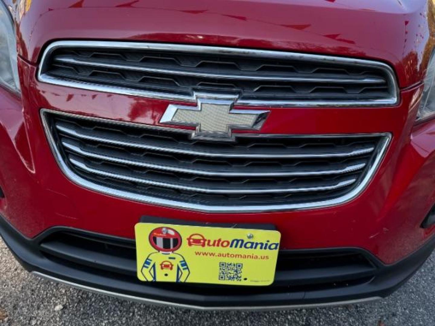 2015 Red Chevrolet Trax LT FWD (KL7CJLSBXFB) with an 1.4L L4 DOHC 16V engine, 6-Speed Automatic transmission, located at 1806 Veterans Memorial Hwy SW, Austell, GA, 30168, (770) 944-9558, 33.817959, -84.606987 - Photo#18