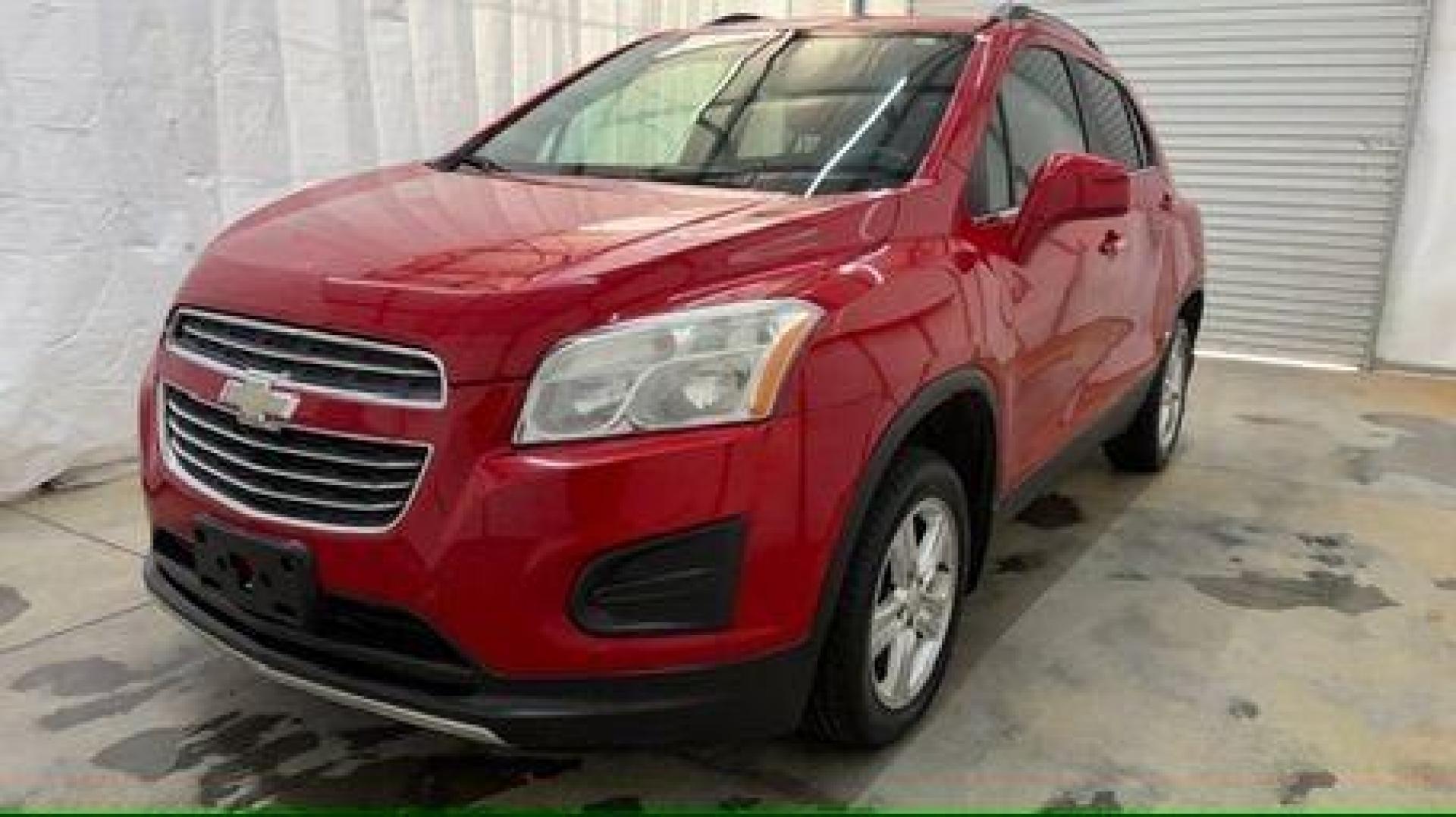 2015 Red Chevrolet Trax LT FWD (KL7CJLSBXFB) with an 1.4L L4 DOHC 16V engine, 6-Speed Automatic transmission, located at 1806 Veterans Memorial Hwy SW, Austell, GA, 30168, (770) 944-9558, 33.817959, -84.606987 - Photo#0