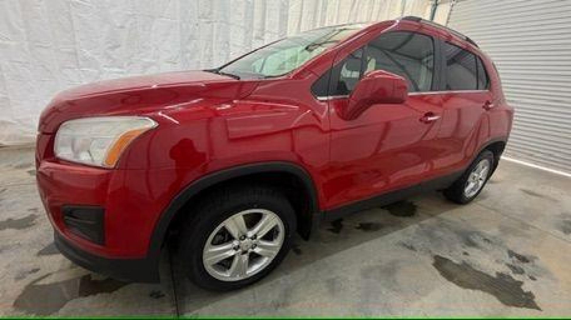 2015 Red Chevrolet Trax LT FWD (KL7CJLSBXFB) with an 1.4L L4 DOHC 16V engine, 6-Speed Automatic transmission, located at 1806 Veterans Memorial Hwy SW, Austell, GA, 30168, (770) 944-9558, 33.817959, -84.606987 - Photo#1