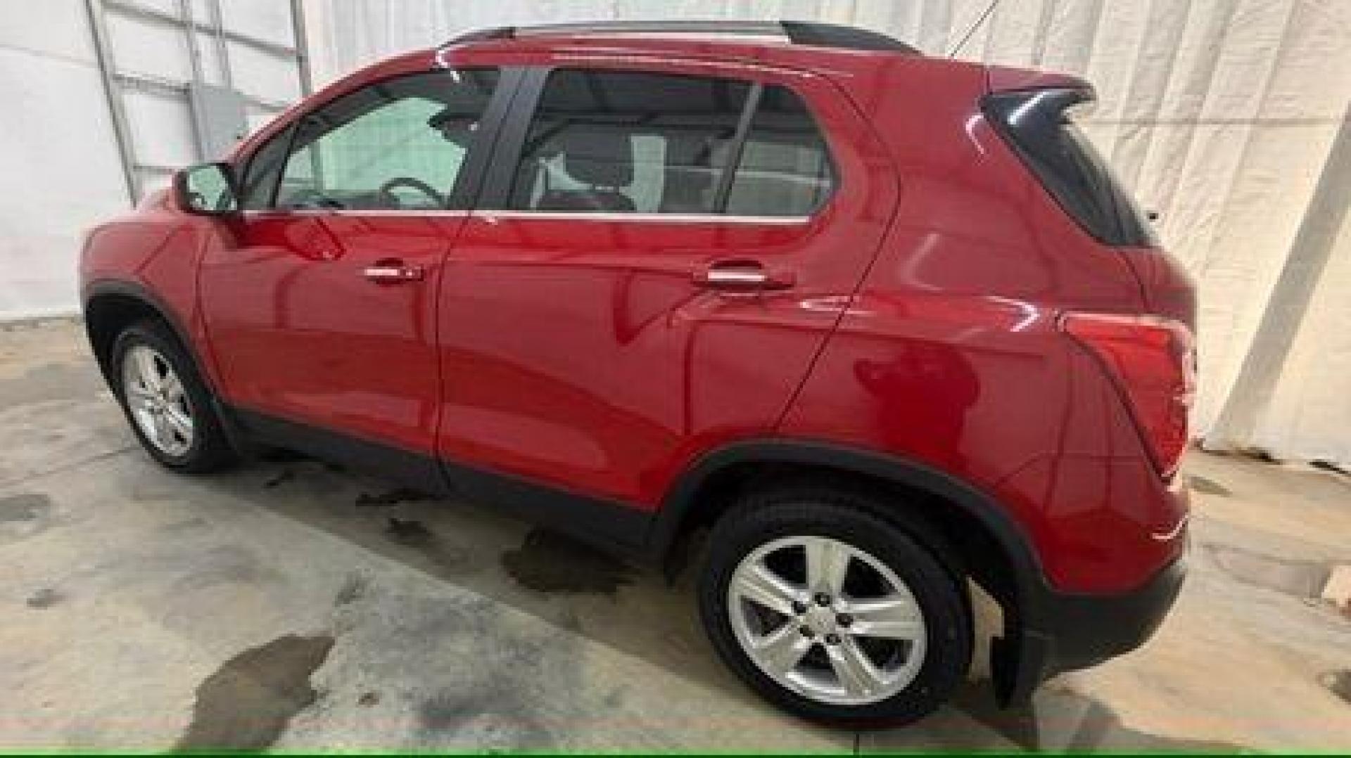 2015 Red Chevrolet Trax LT FWD (KL7CJLSBXFB) with an 1.4L L4 DOHC 16V engine, 6-Speed Automatic transmission, located at 1806 Veterans Memorial Hwy SW, Austell, GA, 30168, (770) 944-9558, 33.817959, -84.606987 - Photo#2