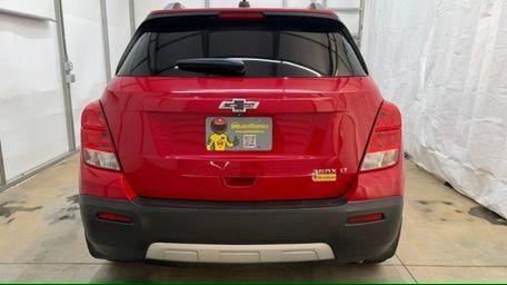 2015 Red Chevrolet Trax LT FWD (KL7CJLSBXFB) with an 1.4L L4 DOHC 16V engine, 6-Speed Automatic transmission, located at 1806 Veterans Memorial Hwy SW, Austell, GA, 30168, (770) 944-9558, 33.817959, -84.606987 - Photo#4