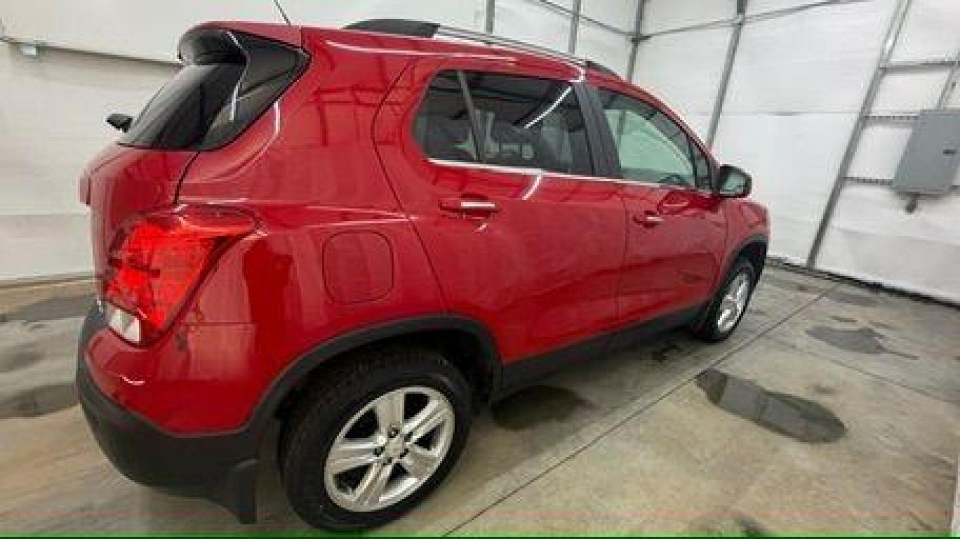 2015 Red Chevrolet Trax LT FWD (KL7CJLSBXFB) with an 1.4L L4 DOHC 16V engine, 6-Speed Automatic transmission, located at 1806 Veterans Memorial Hwy SW, Austell, GA, 30168, (770) 944-9558, 33.817959, -84.606987 - Photo#6