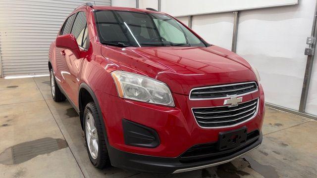 2015 Red Chevrolet Trax LT FWD (KL7CJLSBXFB) with an 1.4L L4 DOHC 16V engine, 6-Speed Automatic transmission, located at 1806 Veterans Memorial Hwy SW, Austell, GA, 30168, (770) 944-9558, 33.817959, -84.606987 - Photo#8