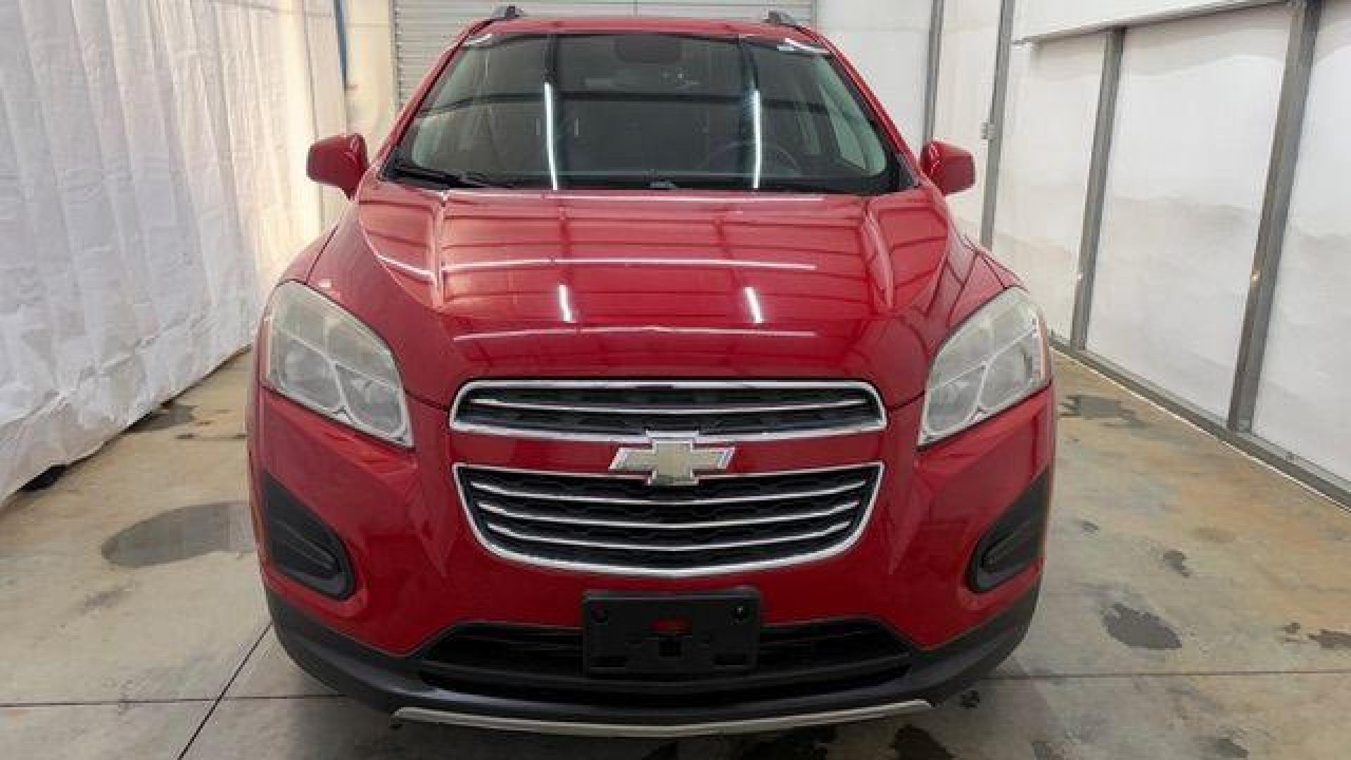 2015 Red Chevrolet Trax LT FWD (KL7CJLSBXFB) with an 1.4L L4 DOHC 16V engine, 6-Speed Automatic transmission, located at 1806 Veterans Memorial Hwy SW, Austell, GA, 30168, (770) 944-9558, 33.817959, -84.606987 - Photo#9