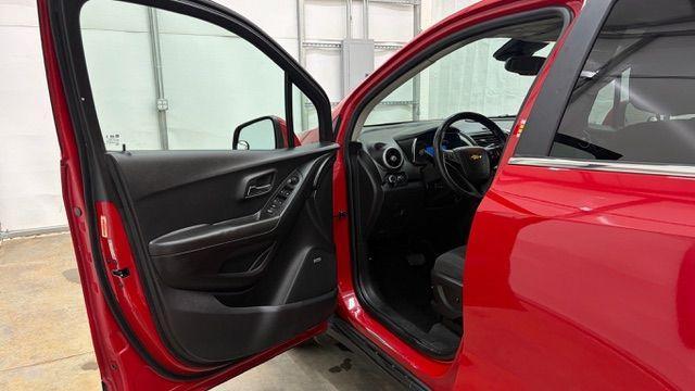 2015 Red Chevrolet Trax LT FWD (KL7CJLSBXFB) with an 1.4L L4 DOHC 16V engine, 6-Speed Automatic transmission, located at 1806 Veterans Memorial Hwy SW, Austell, GA, 30168, (770) 944-9558, 33.817959, -84.606987 - Photo#10