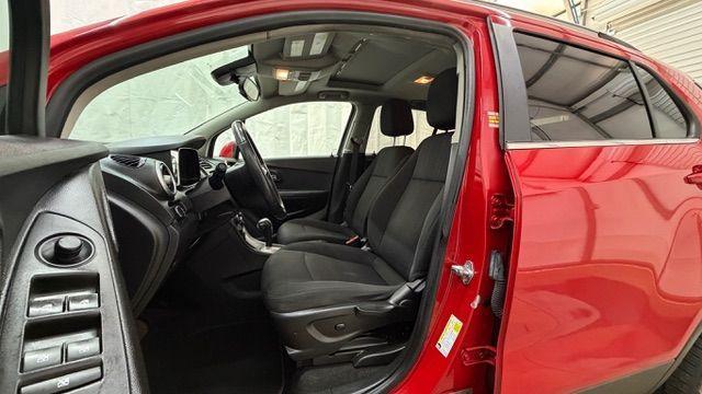 2015 Red Chevrolet Trax LT FWD (KL7CJLSBXFB) with an 1.4L L4 DOHC 16V engine, 6-Speed Automatic transmission, located at 1806 Veterans Memorial Hwy SW, Austell, GA, 30168, (770) 944-9558, 33.817959, -84.606987 - Photo#12