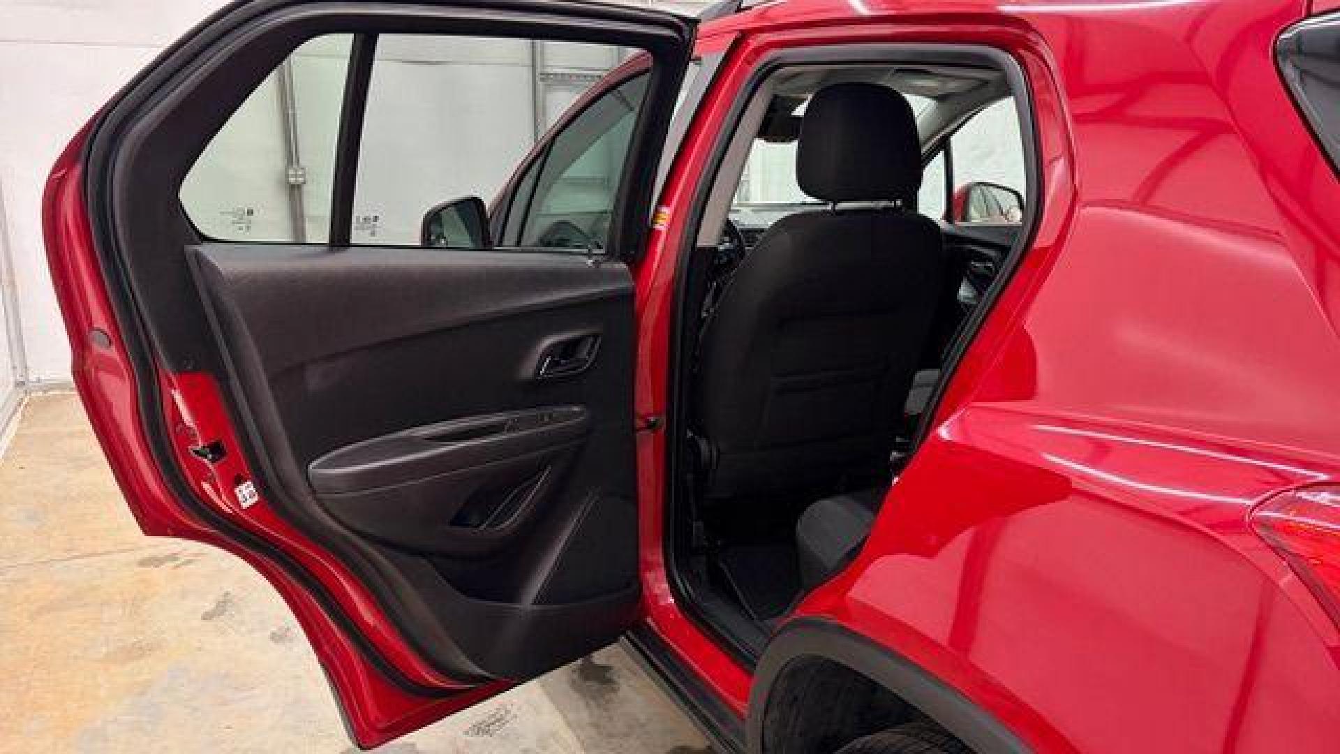 2015 Red Chevrolet Trax LT FWD (KL7CJLSBXFB) with an 1.4L L4 DOHC 16V engine, 6-Speed Automatic transmission, located at 1806 Veterans Memorial Hwy SW, Austell, GA, 30168, (770) 944-9558, 33.817959, -84.606987 - Photo#13