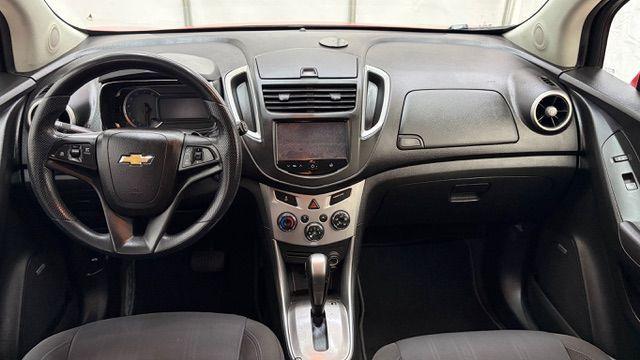 2015 Red Chevrolet Trax LT FWD (KL7CJLSBXFB) with an 1.4L L4 DOHC 16V engine, 6-Speed Automatic transmission, located at 1806 Veterans Memorial Hwy SW, Austell, GA, 30168, (770) 944-9558, 33.817959, -84.606987 - Photo#15