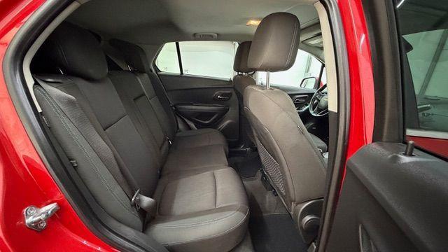2015 Red Chevrolet Trax LT FWD (KL7CJLSBXFB) with an 1.4L L4 DOHC 16V engine, 6-Speed Automatic transmission, located at 1806 Veterans Memorial Hwy SW, Austell, GA, 30168, (770) 944-9558, 33.817959, -84.606987 - Photo#17