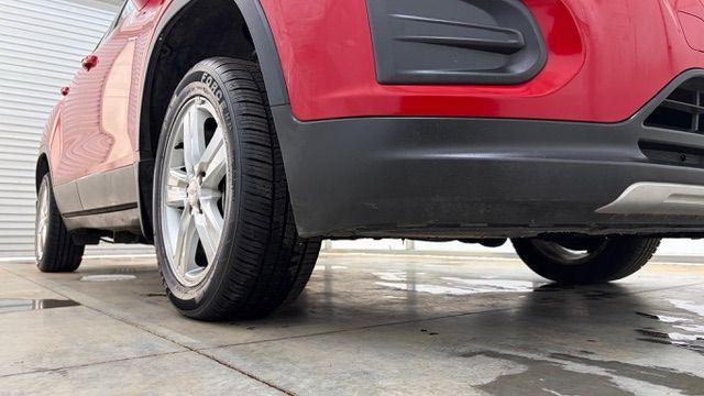 2015 Red Chevrolet Trax LT FWD (KL7CJLSBXFB) with an 1.4L L4 DOHC 16V engine, 6-Speed Automatic transmission, located at 1806 Veterans Memorial Hwy SW, Austell, GA, 30168, (770) 944-9558, 33.817959, -84.606987 - Photo#19
