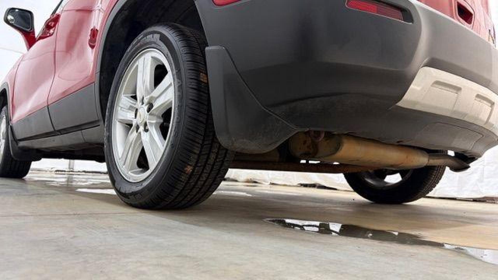 2015 Red Chevrolet Trax LT FWD (KL7CJLSBXFB) with an 1.4L L4 DOHC 16V engine, 6-Speed Automatic transmission, located at 1806 Veterans Memorial Hwy SW, Austell, GA, 30168, (770) 944-9558, 33.817959, -84.606987 - Photo#21