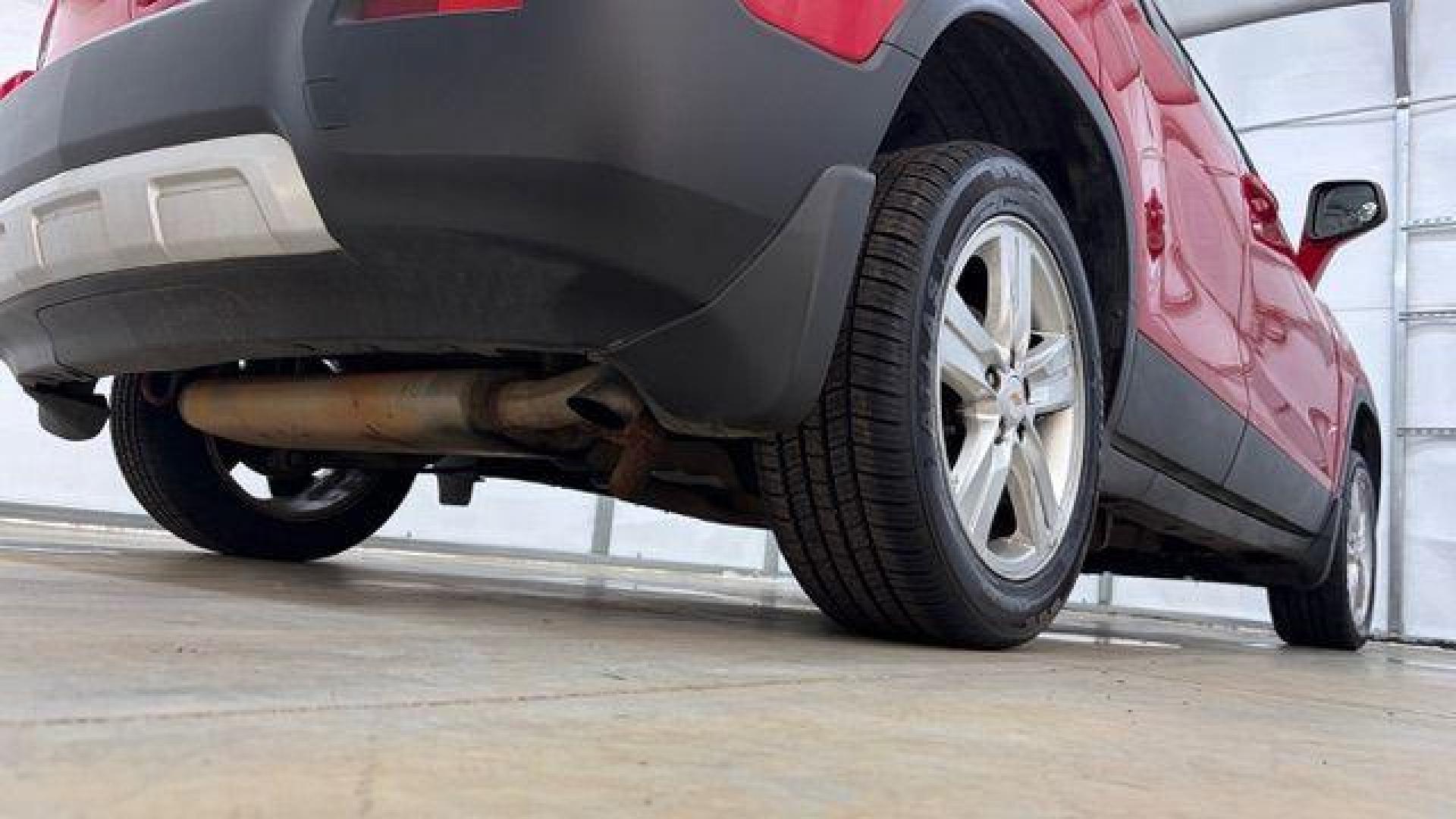 2015 Red Chevrolet Trax LT FWD (KL7CJLSBXFB) with an 1.4L L4 DOHC 16V engine, 6-Speed Automatic transmission, located at 1806 Veterans Memorial Hwy SW, Austell, GA, 30168, (770) 944-9558, 33.817959, -84.606987 - Photo#22