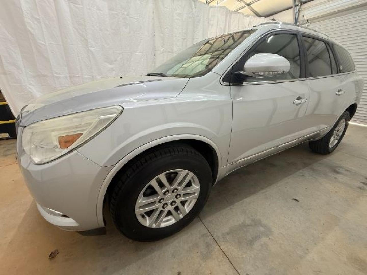2015 Silver Buick Enclave Convenience FWD (5GAKRAKD5FJ) with an 3.6L V6 DOHC 24V engine, 6-Speed Automatic Ov transmission, located at 1806 Veterans Memorial Hwy SW, Austell, GA, 30168, (770) 944-9558, 33.817959, -84.606987 - Photo#1