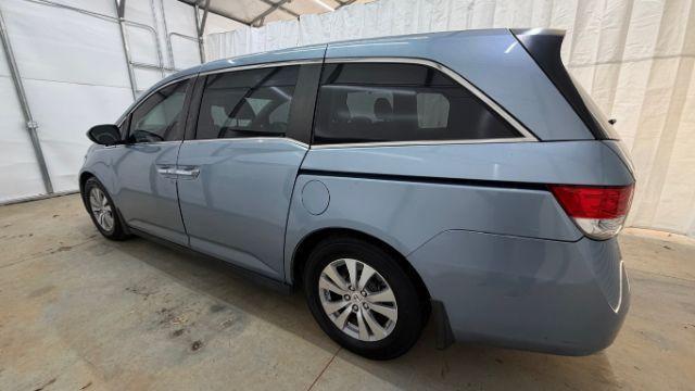 2014 Blue Honda Odyssey EX-L (5FNRL5H61EB) with an 3.5L V6 SOHC 24V engine, 6-Speed Automatic transmission, located at 1806 Veterans Memorial Hwy SW, Austell, GA, 30168, (770) 944-9558, 33.817959, -84.606987 - Photo#2