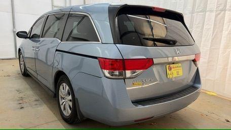 2014 Blue Honda Odyssey EX-L (5FNRL5H61EB) with an 3.5L V6 SOHC 24V engine, 6-Speed Automatic transmission, located at 1806 Veterans Memorial Hwy SW, Austell, GA, 30168, (770) 944-9558, 33.817959, -84.606987 - Photo#3