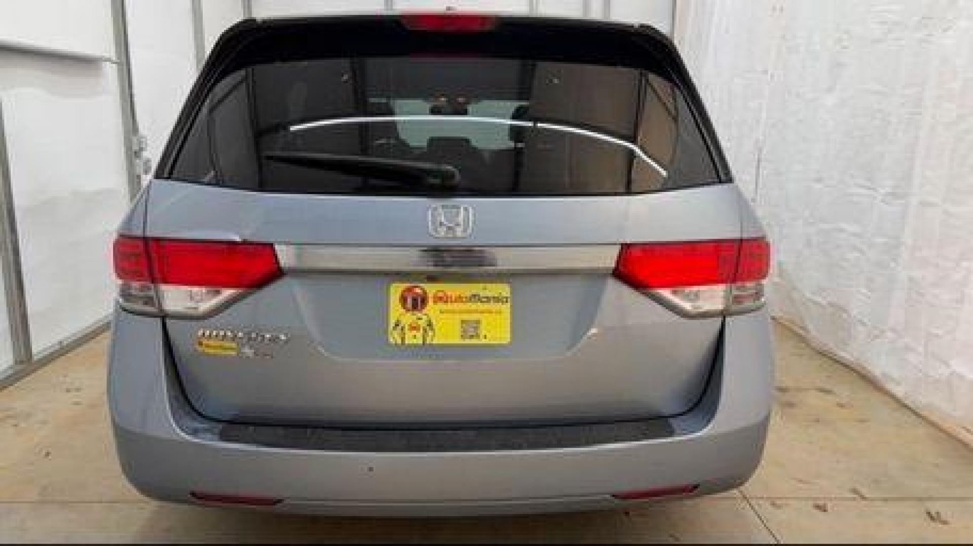 2014 Blue Honda Odyssey EX-L (5FNRL5H61EB) with an 3.5L V6 SOHC 24V engine, 6-Speed Automatic transmission, located at 1806 Veterans Memorial Hwy SW, Austell, GA, 30168, (770) 944-9558, 33.817959, -84.606987 - Photo#4