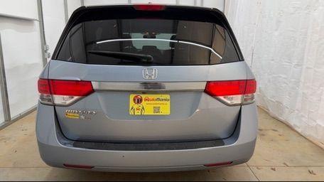 2014 Blue Honda Odyssey EX-L (5FNRL5H61EB) with an 3.5L V6 SOHC 24V engine, 6-Speed Automatic transmission, located at 1806 Veterans Memorial Hwy SW, Austell, GA, 30168, (770) 944-9558, 33.817959, -84.606987 - Photo#4