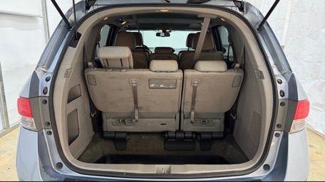 2014 Blue Honda Odyssey EX-L (5FNRL5H61EB) with an 3.5L V6 SOHC 24V engine, 6-Speed Automatic transmission, located at 1806 Veterans Memorial Hwy SW, Austell, GA, 30168, (770) 944-9558, 33.817959, -84.606987 - Photo#5