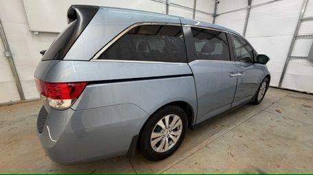 2014 Blue Honda Odyssey EX-L (5FNRL5H61EB) with an 3.5L V6 SOHC 24V engine, 6-Speed Automatic transmission, located at 1806 Veterans Memorial Hwy SW, Austell, GA, 30168, (770) 944-9558, 33.817959, -84.606987 - Photo#7