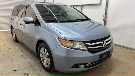 2014 Blue Honda Odyssey EX-L (5FNRL5H61EB) with an 3.5L V6 SOHC 24V engine, 6-Speed Automatic transmission, located at 1806 Veterans Memorial Hwy SW, Austell, GA, 30168, (770) 944-9558, 33.817959, -84.606987 - Photo#9