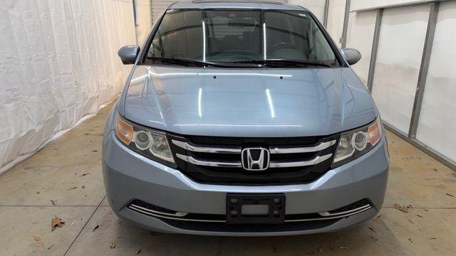 2014 Blue Honda Odyssey EX-L (5FNRL5H61EB) with an 3.5L V6 SOHC 24V engine, 6-Speed Automatic transmission, located at 1806 Veterans Memorial Hwy SW, Austell, GA, 30168, (770) 944-9558, 33.817959, -84.606987 - Photo#10