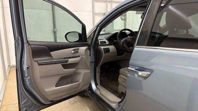 2014 Blue Honda Odyssey EX-L (5FNRL5H61EB) with an 3.5L V6 SOHC 24V engine, 6-Speed Automatic transmission, located at 1806 Veterans Memorial Hwy SW, Austell, GA, 30168, (770) 944-9558, 33.817959, -84.606987 - Photo#11