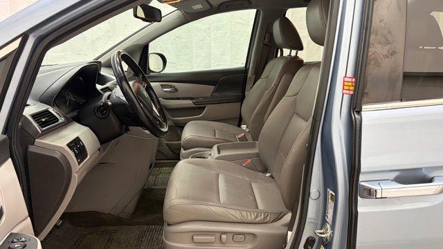 2014 Blue Honda Odyssey EX-L (5FNRL5H61EB) with an 3.5L V6 SOHC 24V engine, 6-Speed Automatic transmission, located at 1806 Veterans Memorial Hwy SW, Austell, GA, 30168, (770) 944-9558, 33.817959, -84.606987 - Photo#12