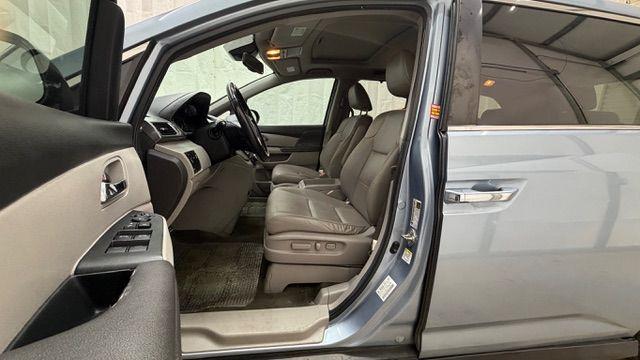 2014 Blue Honda Odyssey EX-L (5FNRL5H61EB) with an 3.5L V6 SOHC 24V engine, 6-Speed Automatic transmission, located at 1806 Veterans Memorial Hwy SW, Austell, GA, 30168, (770) 944-9558, 33.817959, -84.606987 - Photo#13