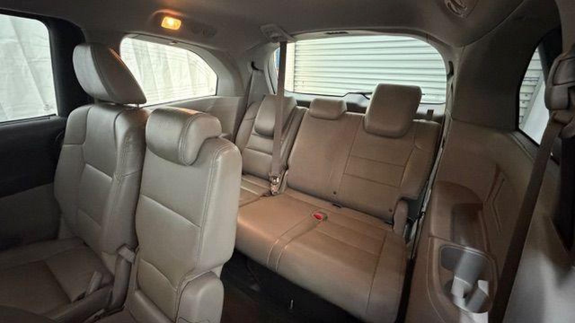 2014 Blue Honda Odyssey EX-L (5FNRL5H61EB) with an 3.5L V6 SOHC 24V engine, 6-Speed Automatic transmission, located at 1806 Veterans Memorial Hwy SW, Austell, GA, 30168, (770) 944-9558, 33.817959, -84.606987 - Photo#15