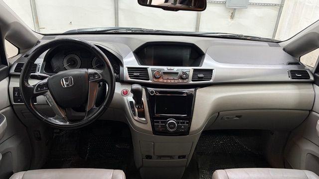 2014 Blue Honda Odyssey EX-L (5FNRL5H61EB) with an 3.5L V6 SOHC 24V engine, 6-Speed Automatic transmission, located at 1806 Veterans Memorial Hwy SW, Austell, GA, 30168, (770) 944-9558, 33.817959, -84.606987 - Photo#16