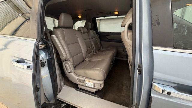 2014 Blue Honda Odyssey EX-L (5FNRL5H61EB) with an 3.5L V6 SOHC 24V engine, 6-Speed Automatic transmission, located at 1806 Veterans Memorial Hwy SW, Austell, GA, 30168, (770) 944-9558, 33.817959, -84.606987 - Photo#17