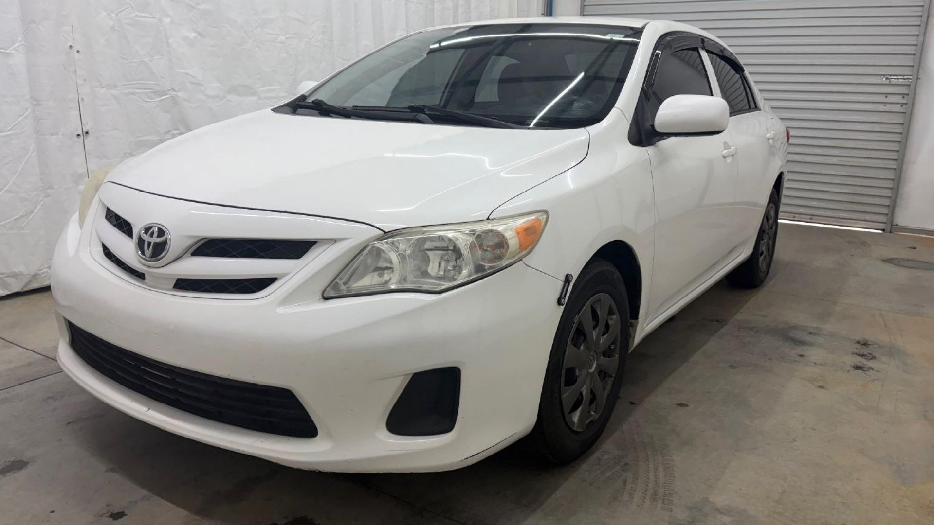 2013 White Toyota Corolla LE 4-Speed AT (JTDBU4EE4DJ) with an 1.8L L4 DOHC 16V engine, 4-Speed Automatic transmission, located at 1806 Veterans Memorial Hwy SW, Austell, GA, 30168, (770) 944-9558, 33.817959, -84.606987- Photo#0