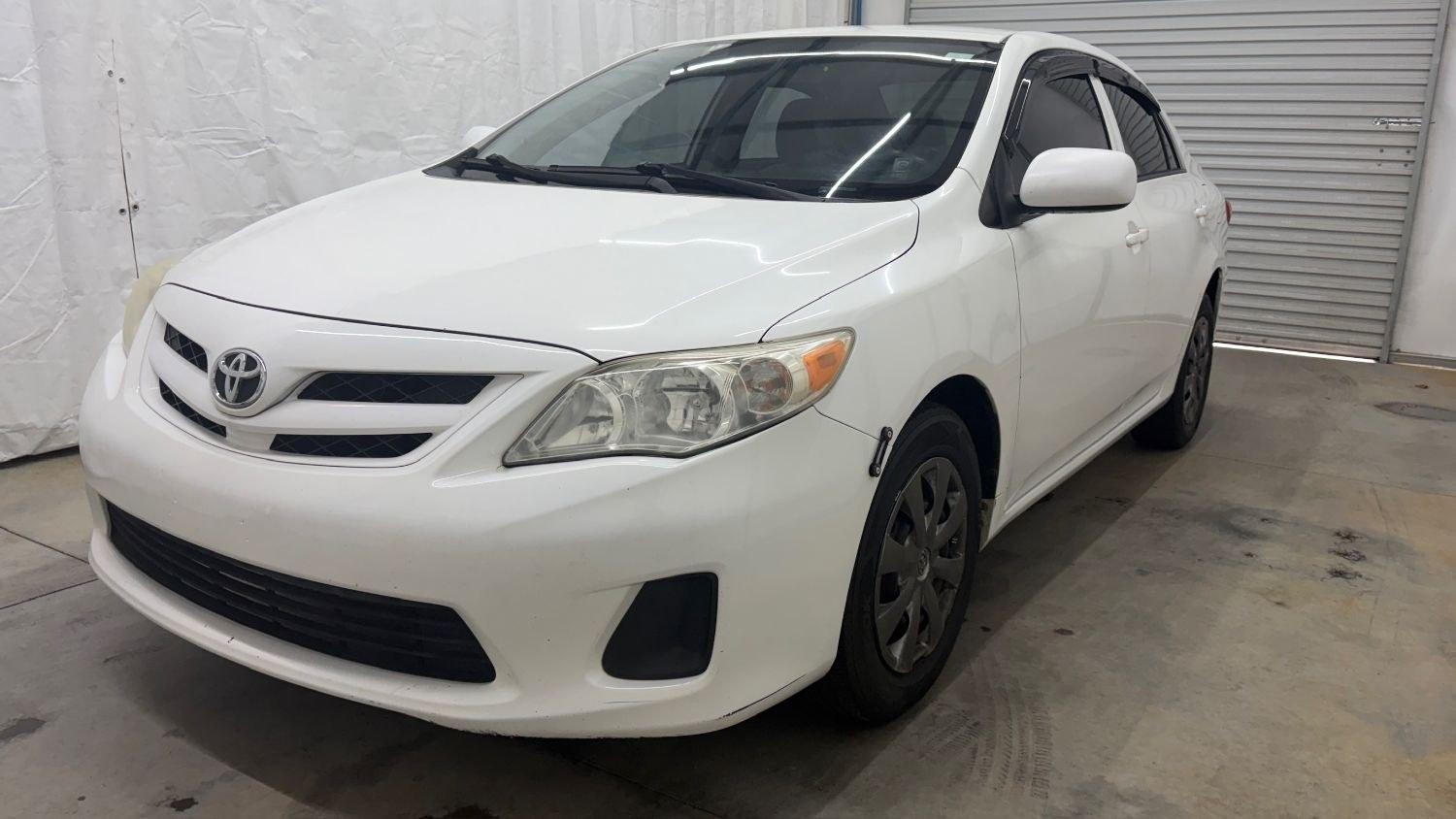 2013 White Toyota Corolla LE 4-Speed AT (JTDBU4EE4DJ) with an 1.8L L4 DOHC 16V engine, 4-Speed Automatic transmission, located at 1806 Veterans Memorial Hwy SW, Austell, GA, 30168, (770) 944-9558, 33.817959, -84.606987 - Photo#0