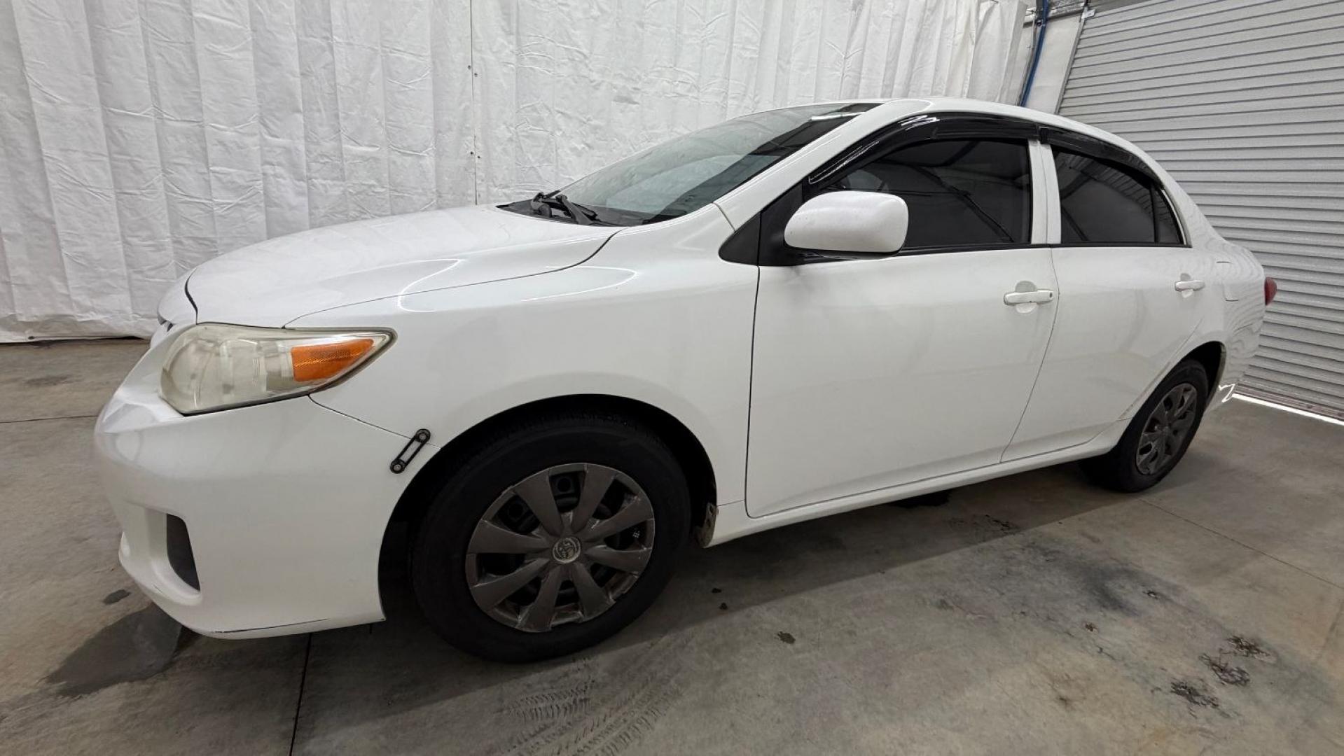 2013 White Toyota Corolla LE 4-Speed AT (JTDBU4EE4DJ) with an 1.8L L4 DOHC 16V engine, 4-Speed Automatic transmission, located at 1806 Veterans Memorial Hwy SW, Austell, GA, 30168, (770) 944-9558, 33.817959, -84.606987- Photo#1