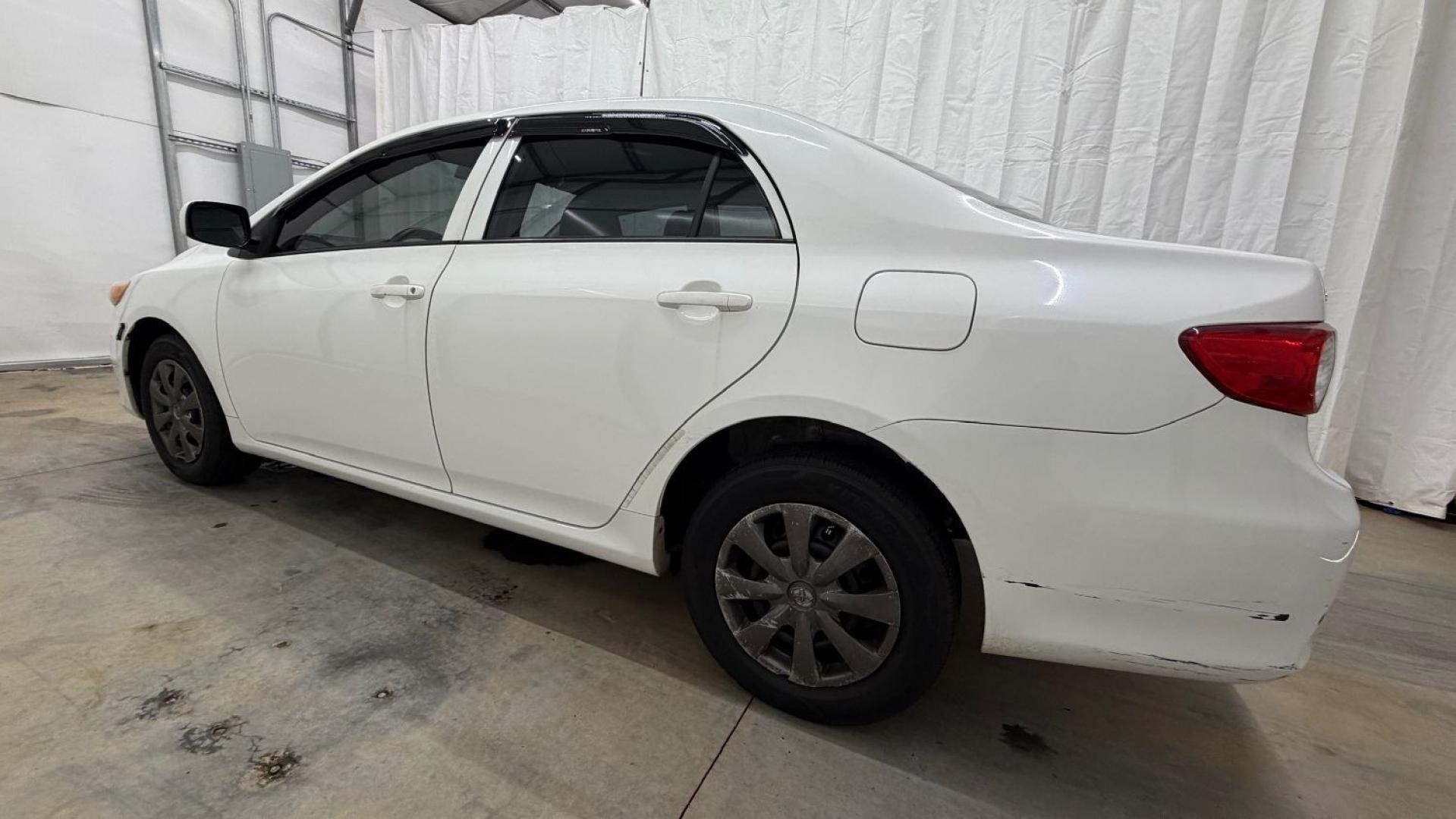 2013 White Toyota Corolla LE 4-Speed AT (JTDBU4EE4DJ) with an 1.8L L4 DOHC 16V engine, 4-Speed Automatic transmission, located at 1806 Veterans Memorial Hwy SW, Austell, GA, 30168, (770) 944-9558, 33.817959, -84.606987- Photo#2