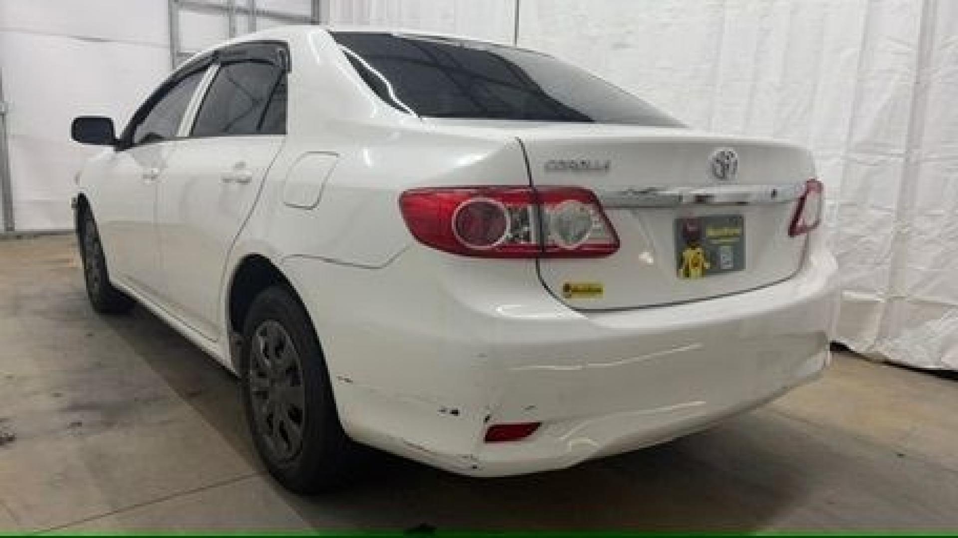 2013 White Toyota Corolla LE 4-Speed AT (JTDBU4EE4DJ) with an 1.8L L4 DOHC 16V engine, 4-Speed Automatic transmission, located at 1806 Veterans Memorial Hwy SW, Austell, GA, 30168, (770) 944-9558, 33.817959, -84.606987- Photo#3
