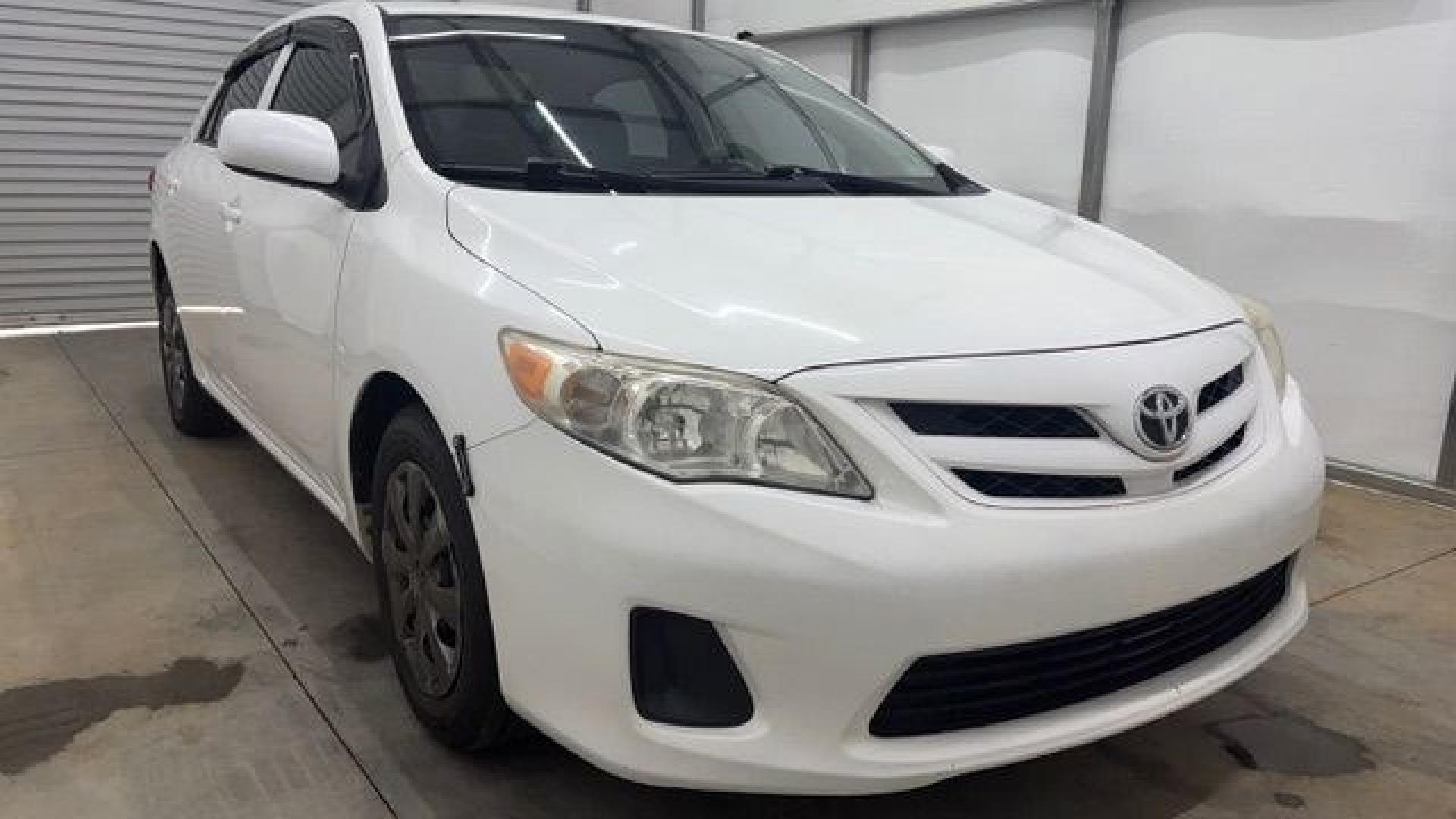 2013 White Toyota Corolla LE 4-Speed AT (JTDBU4EE4DJ) with an 1.8L L4 DOHC 16V engine, 4-Speed Automatic transmission, located at 1806 Veterans Memorial Hwy SW, Austell, GA, 30168, (770) 944-9558, 33.817959, -84.606987- Photo#8