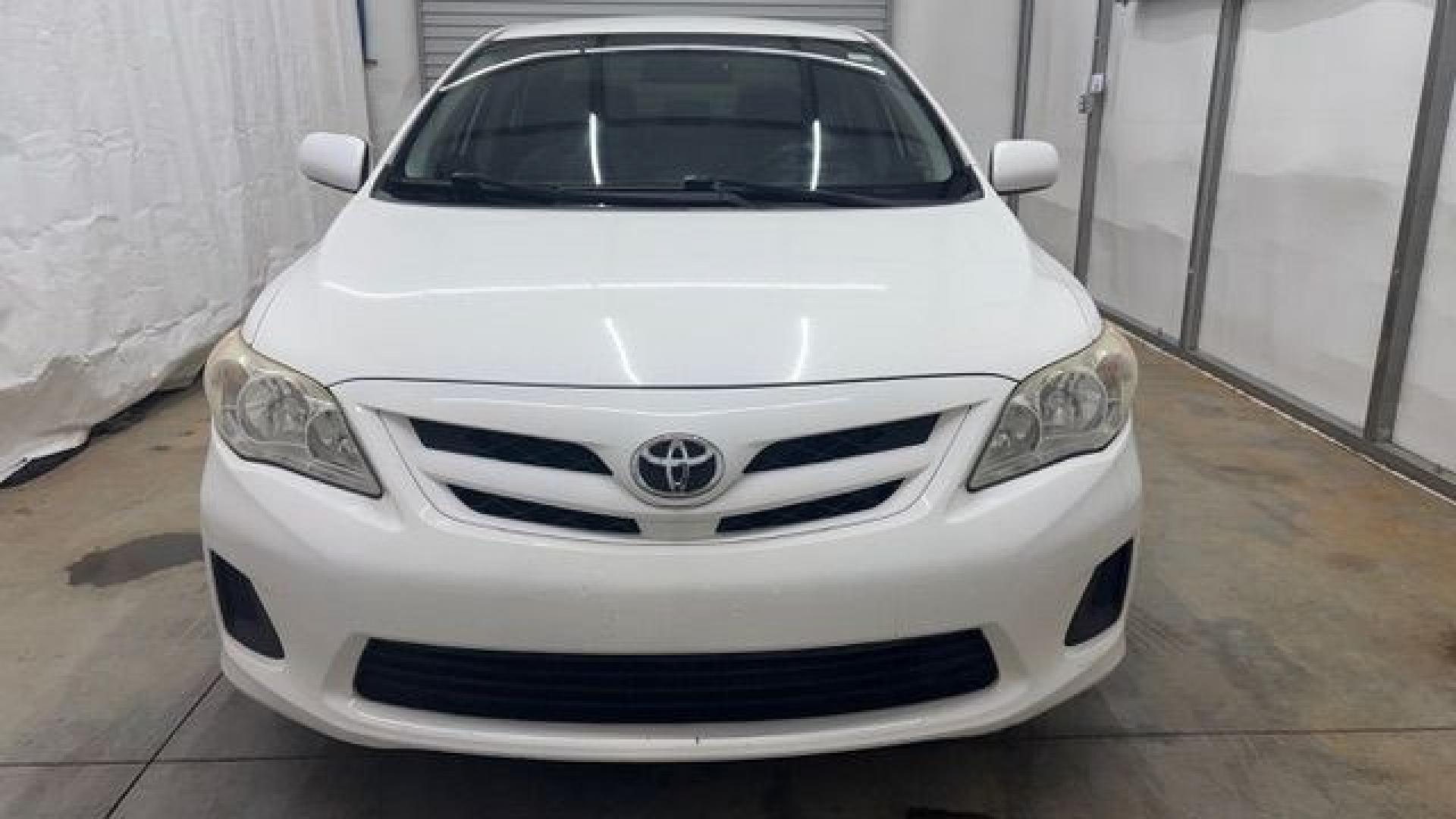 2013 White Toyota Corolla LE 4-Speed AT (JTDBU4EE4DJ) with an 1.8L L4 DOHC 16V engine, 4-Speed Automatic transmission, located at 1806 Veterans Memorial Hwy SW, Austell, GA, 30168, (770) 944-9558, 33.817959, -84.606987- Photo#9