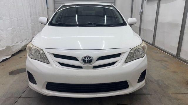 2013 White Toyota Corolla LE 4-Speed AT (JTDBU4EE4DJ) with an 1.8L L4 DOHC 16V engine, 4-Speed Automatic transmission, located at 1806 Veterans Memorial Hwy SW, Austell, GA, 30168, (770) 944-9558, 33.817959, -84.606987 - Photo#9