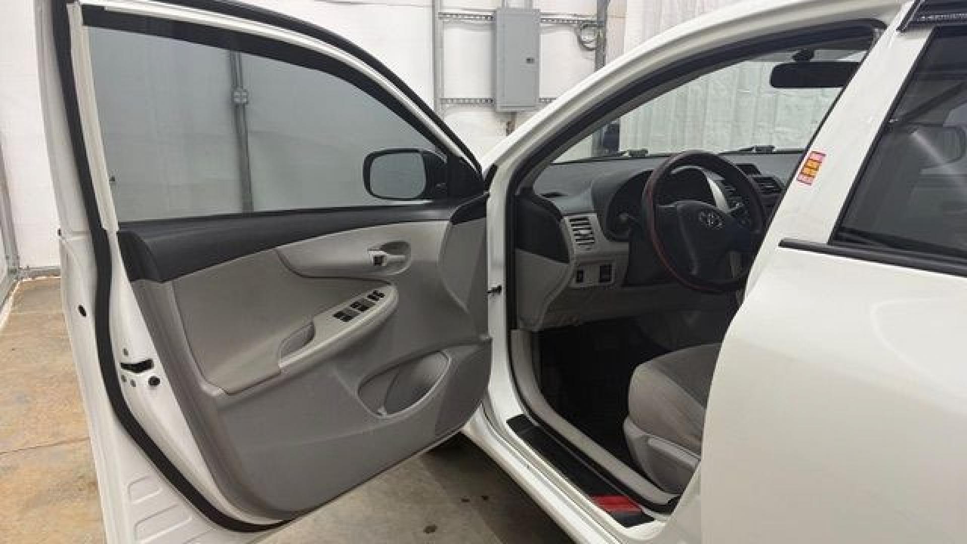 2013 White Toyota Corolla LE 4-Speed AT (JTDBU4EE4DJ) with an 1.8L L4 DOHC 16V engine, 4-Speed Automatic transmission, located at 1806 Veterans Memorial Hwy SW, Austell, GA, 30168, (770) 944-9558, 33.817959, -84.606987- Photo#10