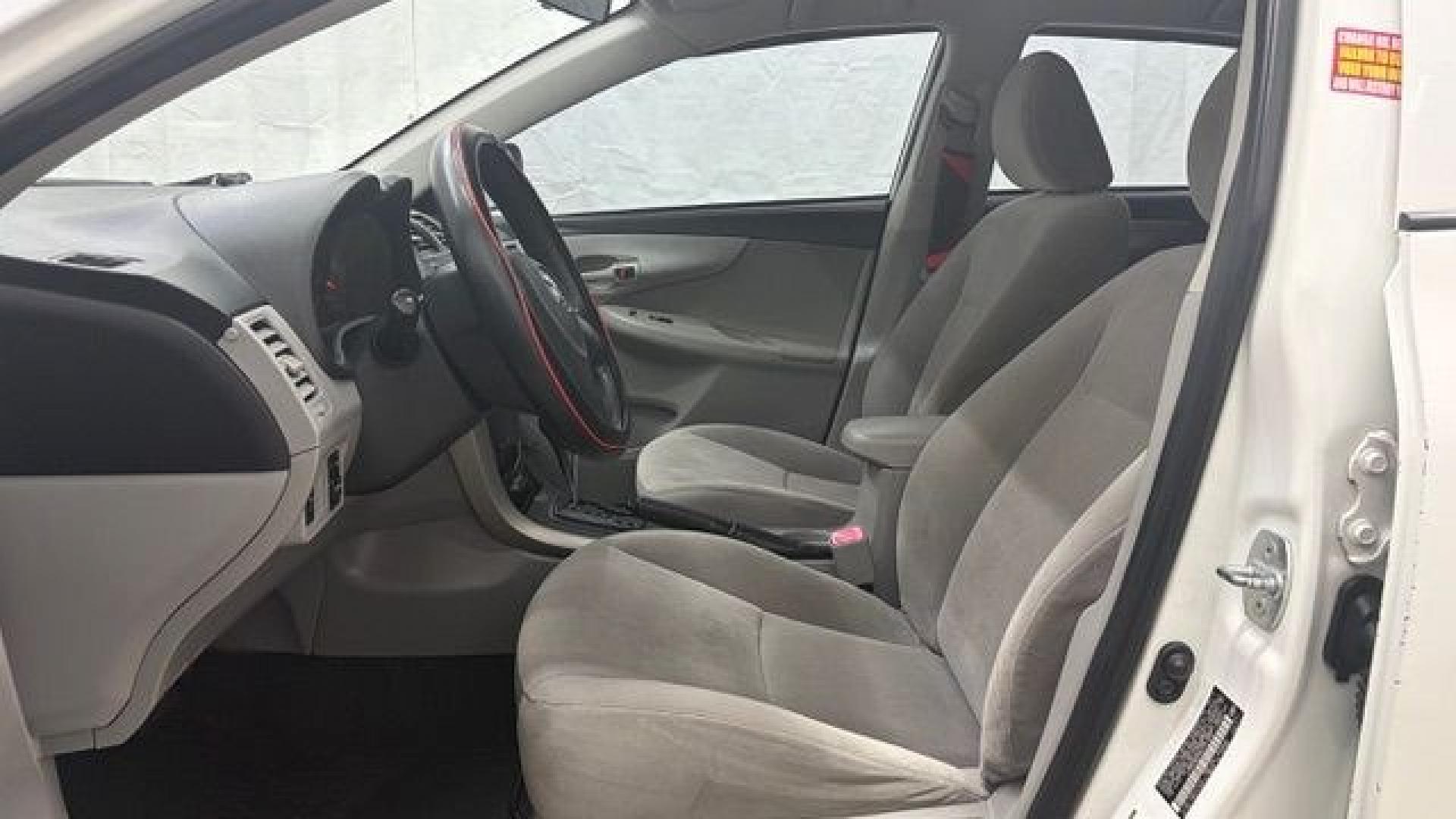 2013 White Toyota Corolla LE 4-Speed AT (JTDBU4EE4DJ) with an 1.8L L4 DOHC 16V engine, 4-Speed Automatic transmission, located at 1806 Veterans Memorial Hwy SW, Austell, GA, 30168, (770) 944-9558, 33.817959, -84.606987- Photo#11