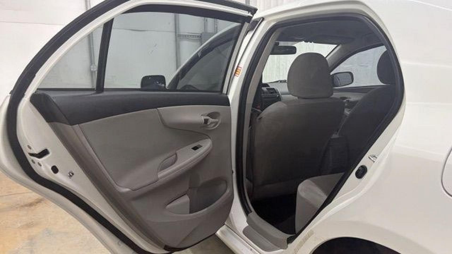 2013 White Toyota Corolla LE 4-Speed AT (JTDBU4EE4DJ) with an 1.8L L4 DOHC 16V engine, 4-Speed Automatic transmission, located at 1806 Veterans Memorial Hwy SW, Austell, GA, 30168, (770) 944-9558, 33.817959, -84.606987- Photo#13